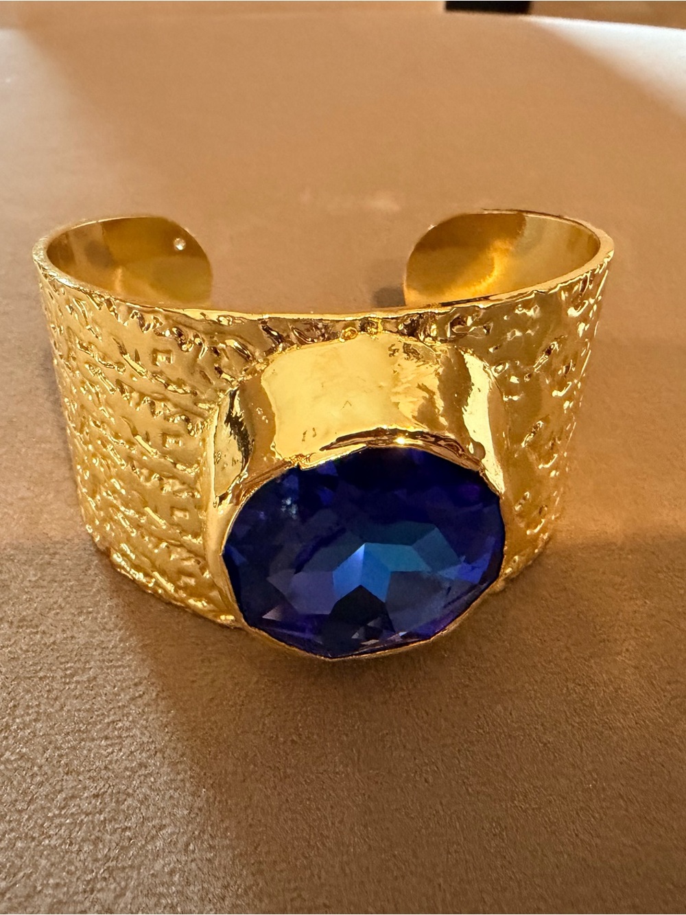 Gold Cuff Bracelet with Large Blue Gem